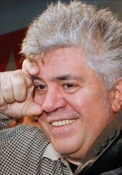 Almodóvar making a brow gesture